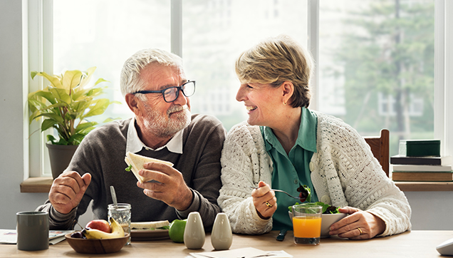 A couple eating a health meal together