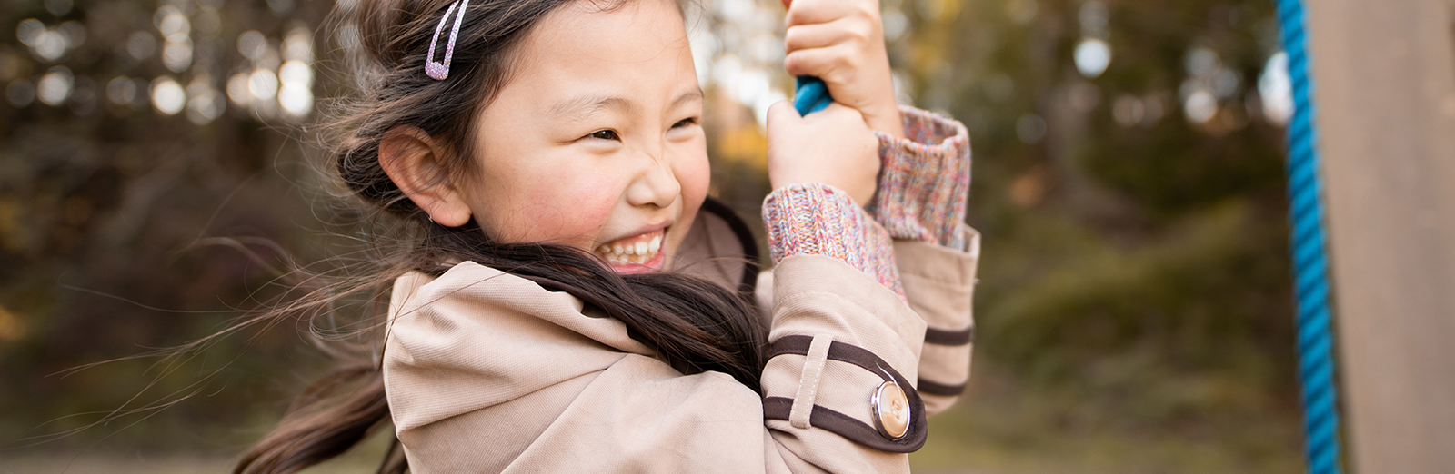 A child swinging at a playground