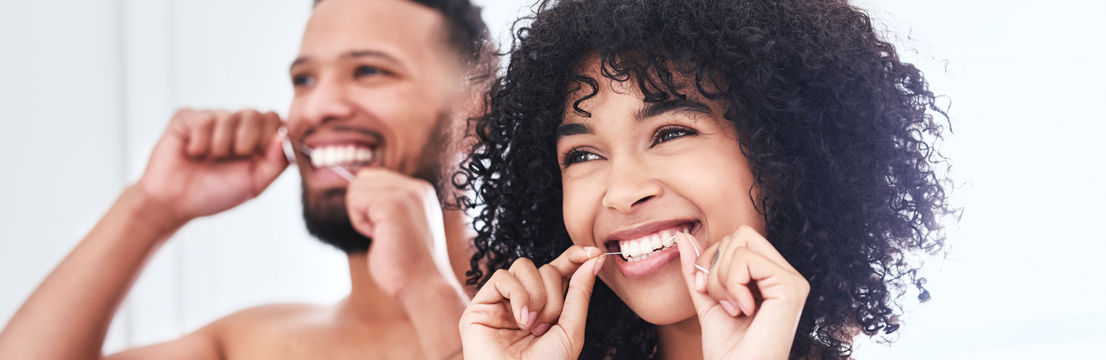 A couple flossing together