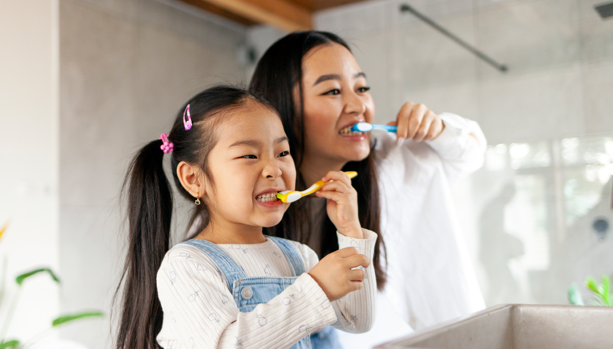 mom-and-daughter-brushing-their-teeth-1200x683.png