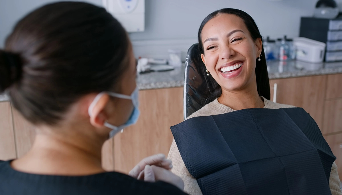 woman-smiling-in-dental-chair_1200x683.webp