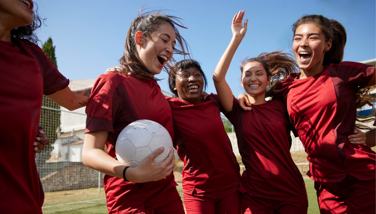 A group of soccer players celebrating
