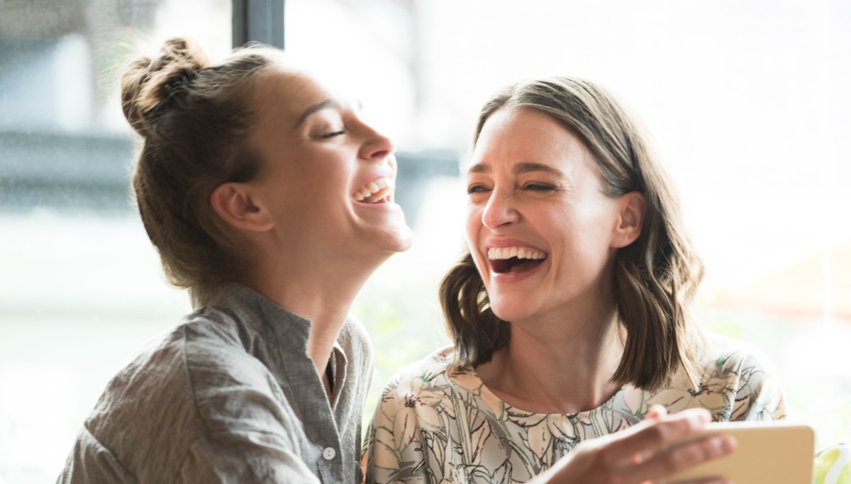 Two women laughing